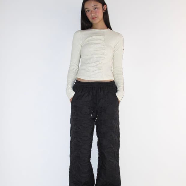 론론 퍼 트림 리본 퀄팅 팬츠 블랙