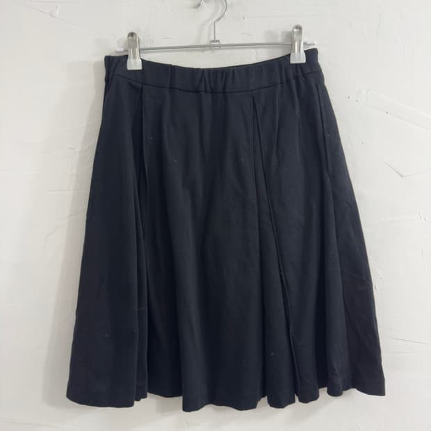 pom ponette pleats midi skirt