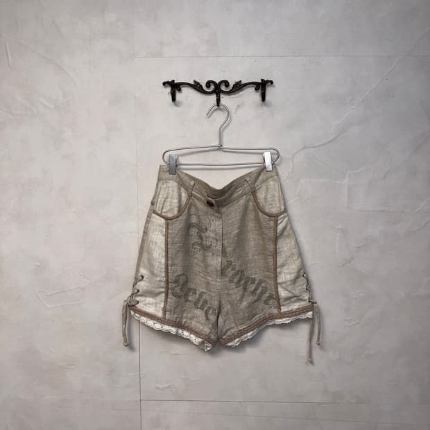 Beige linen laceup lettering shorts