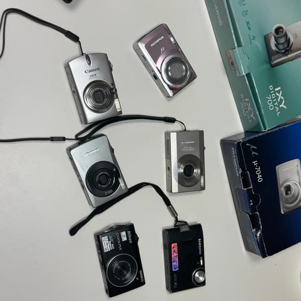 올림푸스 뮤7040, 캐논 익시700, 익서스90IS, 익서스75 