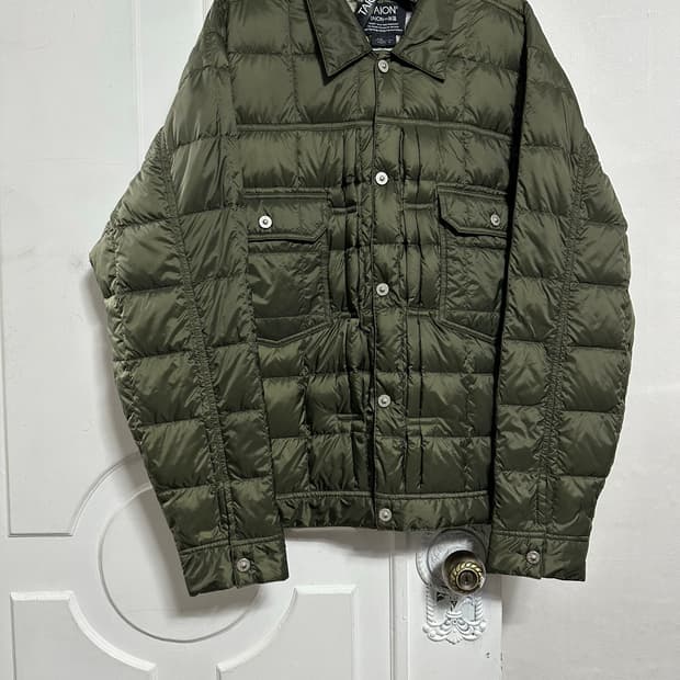 타이온 트러커 경량패딩