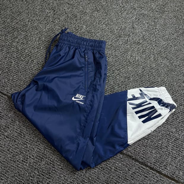 나이키 빅로고 윈드러너 라인드 우븐 조거 팬츠 2201