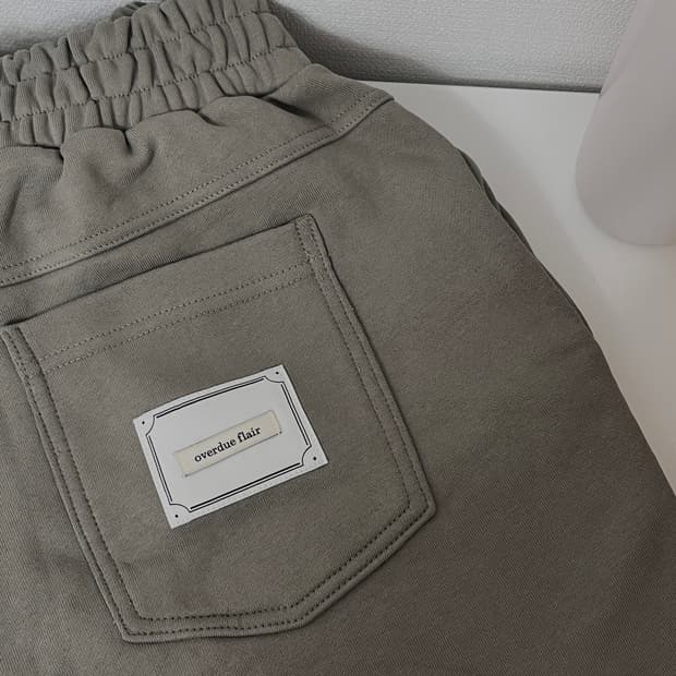새상품) 오버듀플레어 SWEAT PANTS_KHAKI