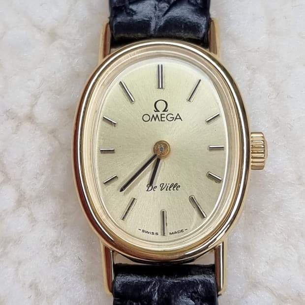 오메가 드빌 빈티지 오벌 샴페인 선레이다이얼 수동 여성시계