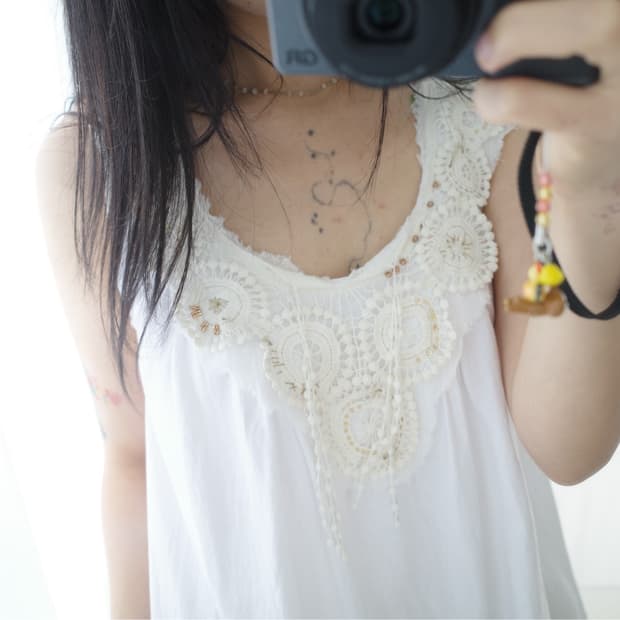 Motif sleeveless
