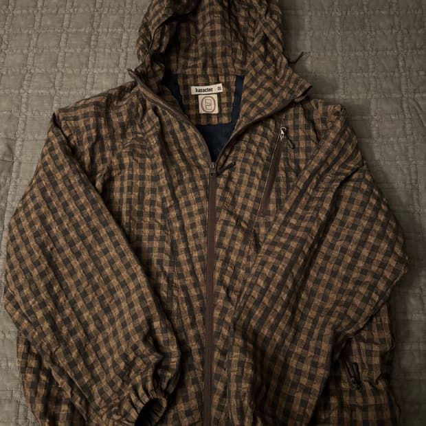 [01] 카락터 스매시 체크 윈드브레이커 브라운