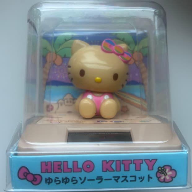 헬로키티 태양열피규어 태닝키티