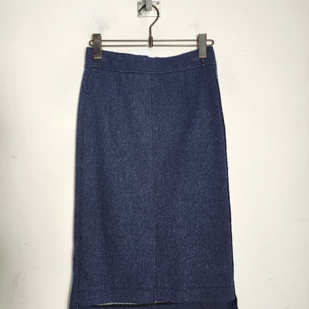 시스템 울 혼방 미디 스커트