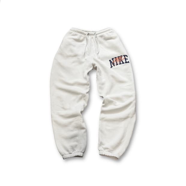 Nike 클럽 플리스 커프스 팬츠