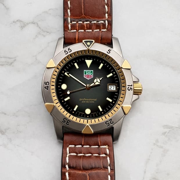 태그호이어 프로패셔널 1500 버락 오바마 시계