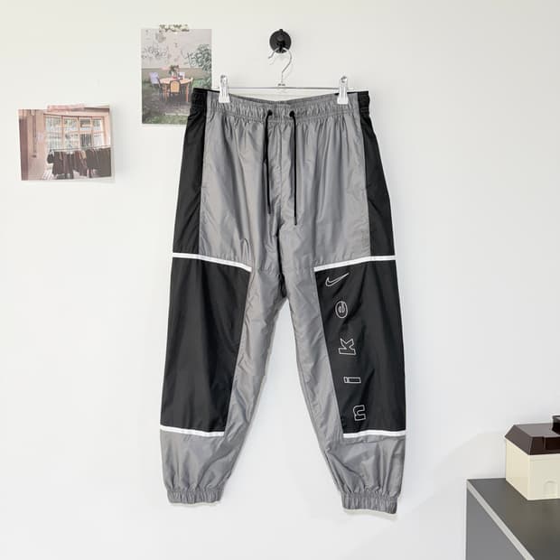 [L] 나이키 우먼스 RMX 우븐팬츠