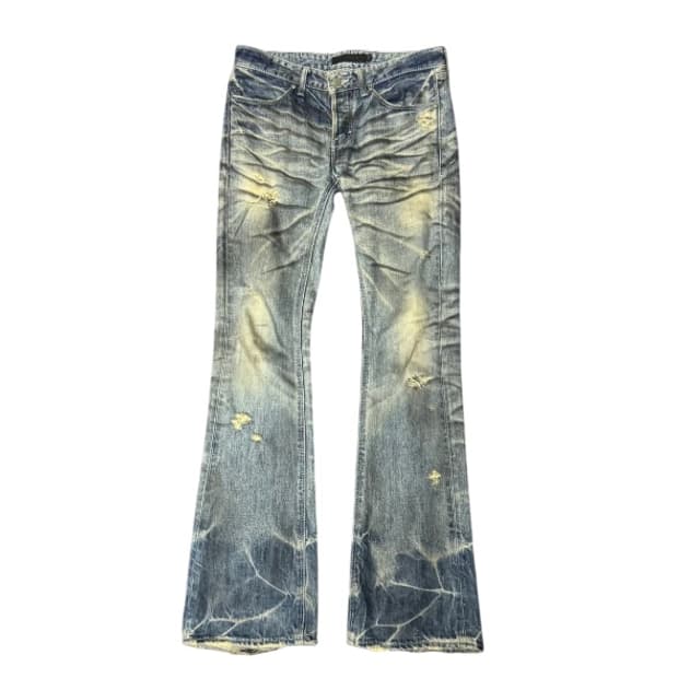 Fuga pierced distressed boots cut denim