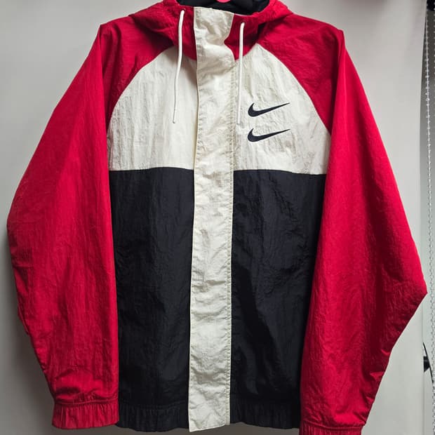 나이키 더블 스우시 바람막이 자켓 100