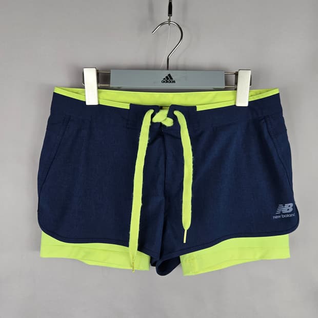 [무료배송]뉴발란스 75(M) 여성 비치웨어 수영복 반바지 쇼츠 래쉬가드