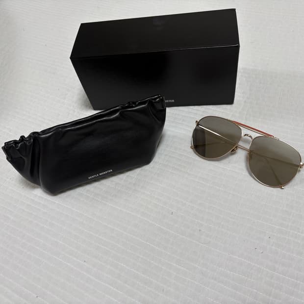 젠틀몬스터 미오미오 금테 선글라스