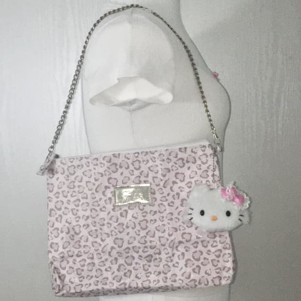 Cecil Mcbee pale pink leopard clutch