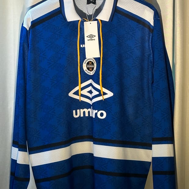 엄브로_레이스업 메쉬 긴팔 티셔츠