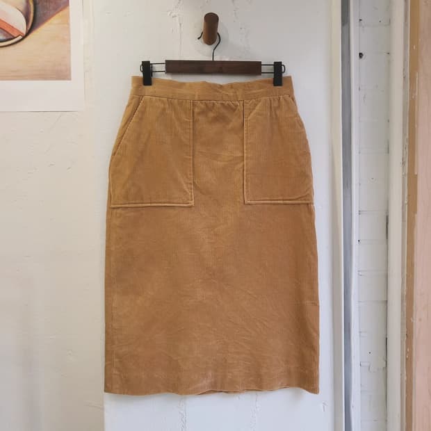 Candela 아웃포켓 코듀로이 미디스커트