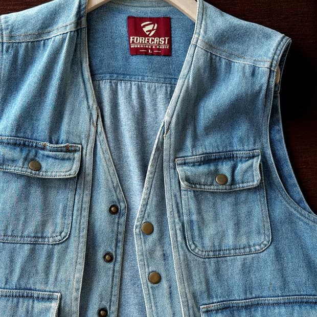 Washed denim fabric utility vest
