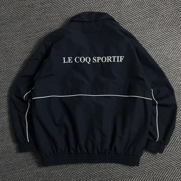 르꼬끄 빅로고 박시핏 우븐 바람막이 자켓o 5025