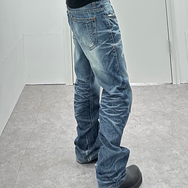 Upset jeans fade lines destroyed denim