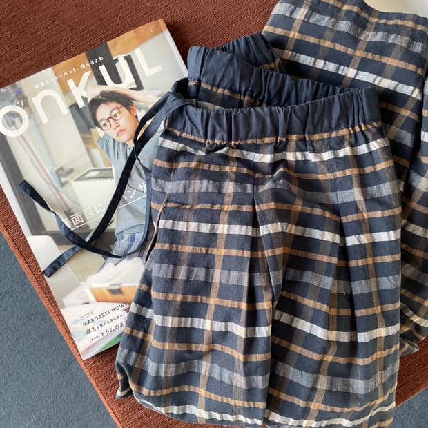 Banding check long skirt