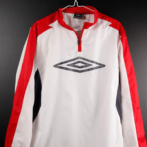 엄브로 하프집업 웜엄