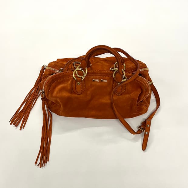 미우미우 아방뛰르 스웨이드 태슬백