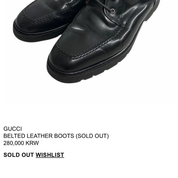 Gucci belted leather boots