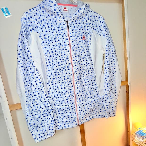 [Le Coq Sportif] 르꼬끄 플라워 그래픽 윈드브레이커 후드 집