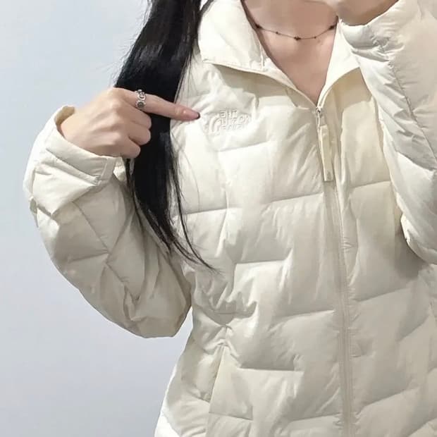 노스페이스 아이보리 경량 패딩