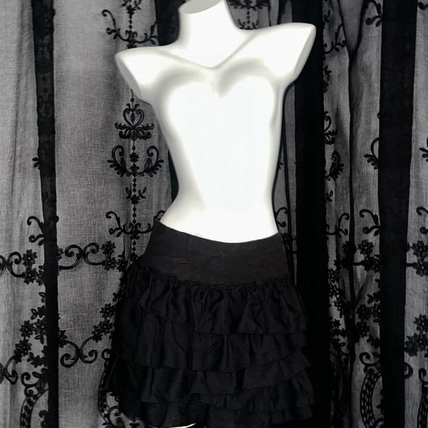 black tiered mini skirt
