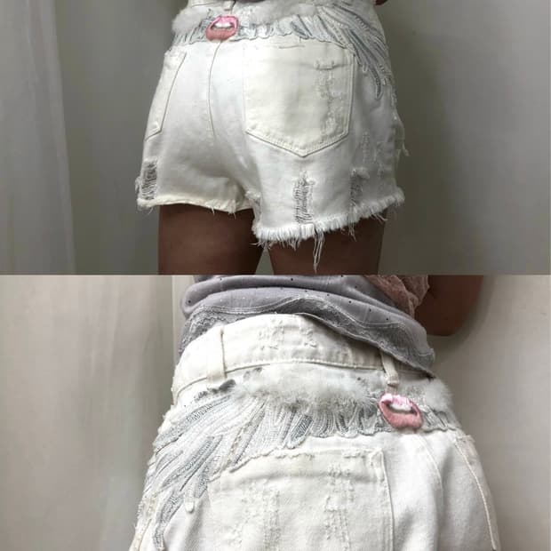 lip wings embroidery distressed pants