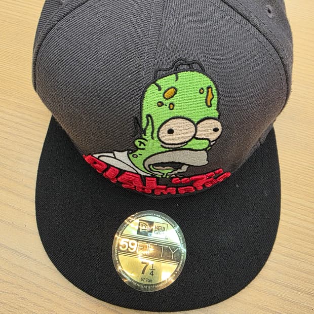 뉴에라 x 심슨 스냅백 57.7