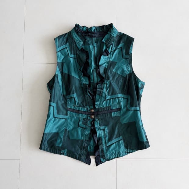 geometric ruffle vest