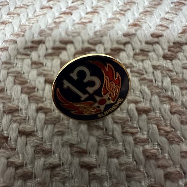 SUPREME pin badge