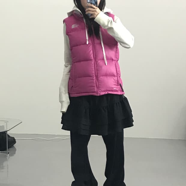 The North Face Pink Puffer Vests