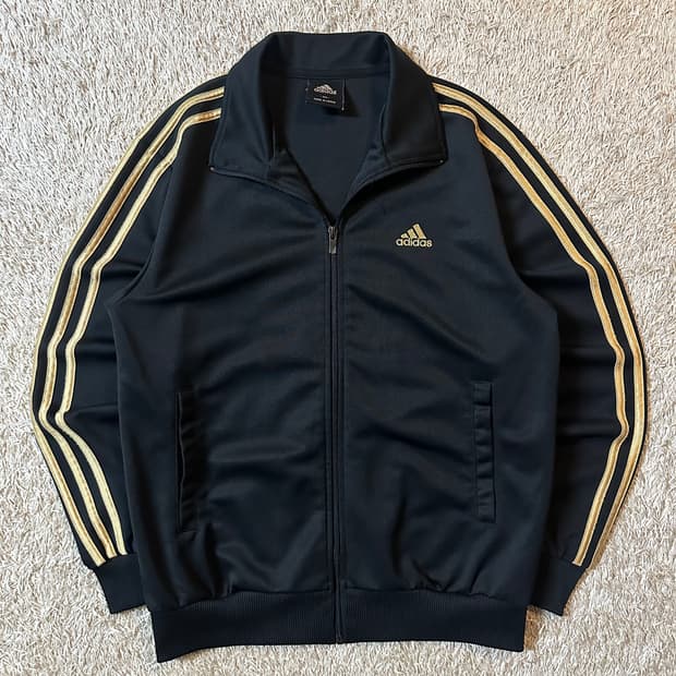 아디다스 ADIDAS 삼각로고 검골 큐빅 트랙탑 져지 블랙 골드
