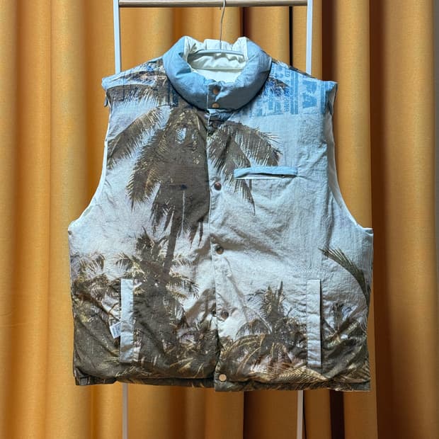 [L] 스투시 피터 서덜랜드 리버시블 다운 베스트