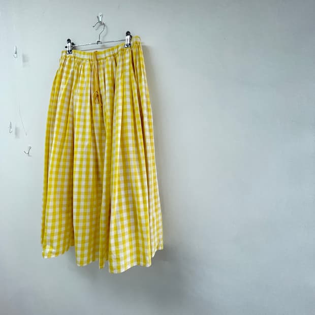 woxchehou밝은 노랑 체크스커트