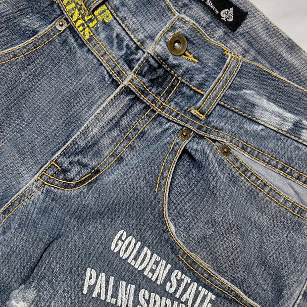 ​[M] 정글스톰(Jungle Storm) Y2K 그래픽 롤업 데님 팬츠