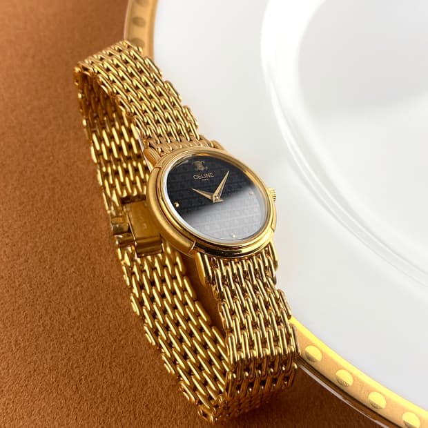 CELINE round triomphe gold watch