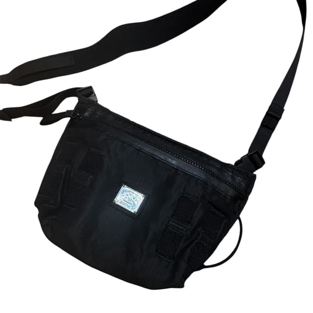 아크네 스튜디오 페이스 모티프 크로스백