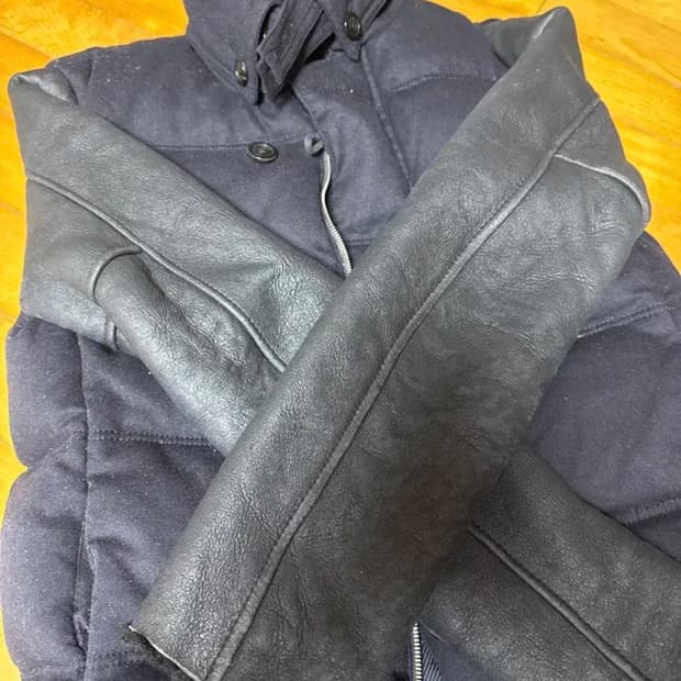 우영미 레더 자켓