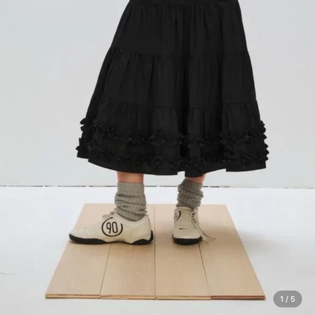 플리즈프로젝트 미들 프릴 스커트 블랙