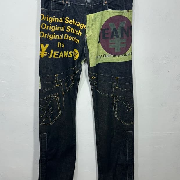 yen jean graphic print raw denim pants