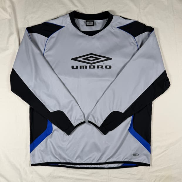 엄브로 바람막이 웜업 피스테