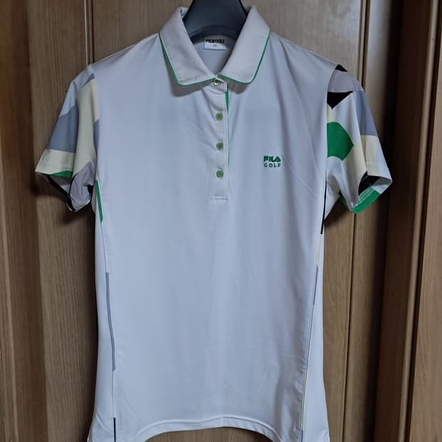 휠라 골프 여성 반팔티 100