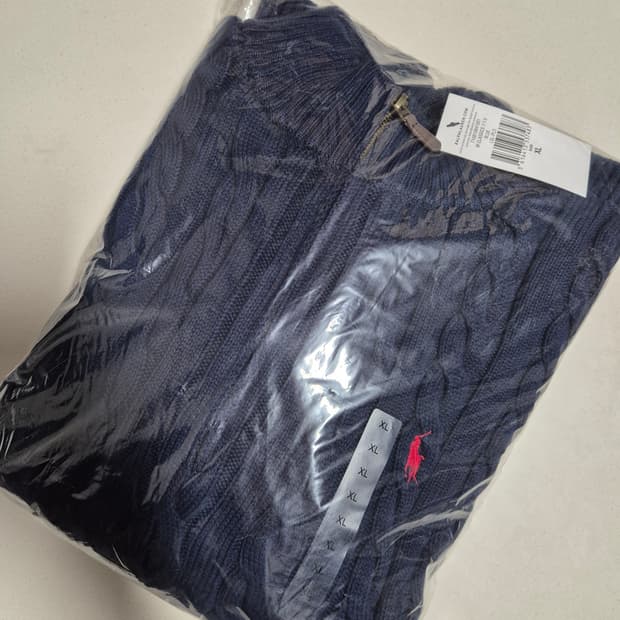 폴로 반집업 니트