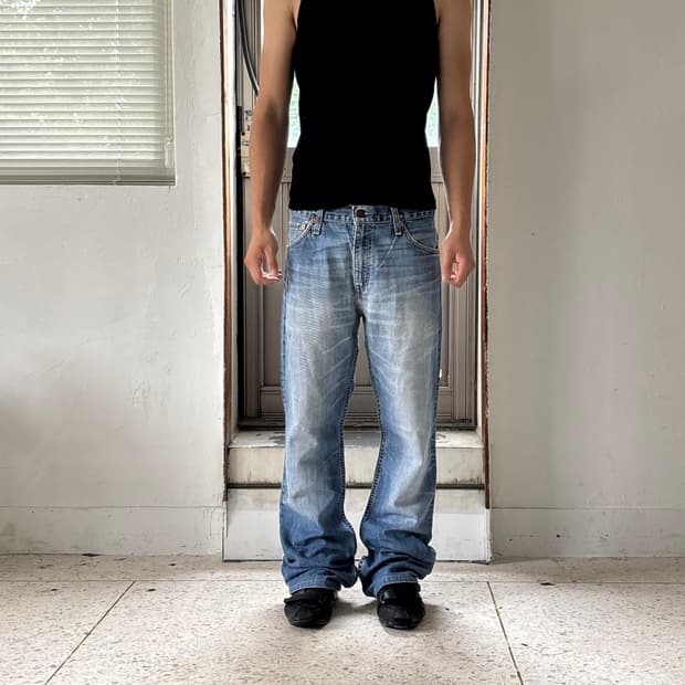 Levi’s 507 워싱 부츠컷 데님 팬츠